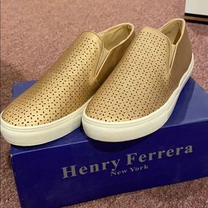 Henry Ferrera New York gold perforated sneakers